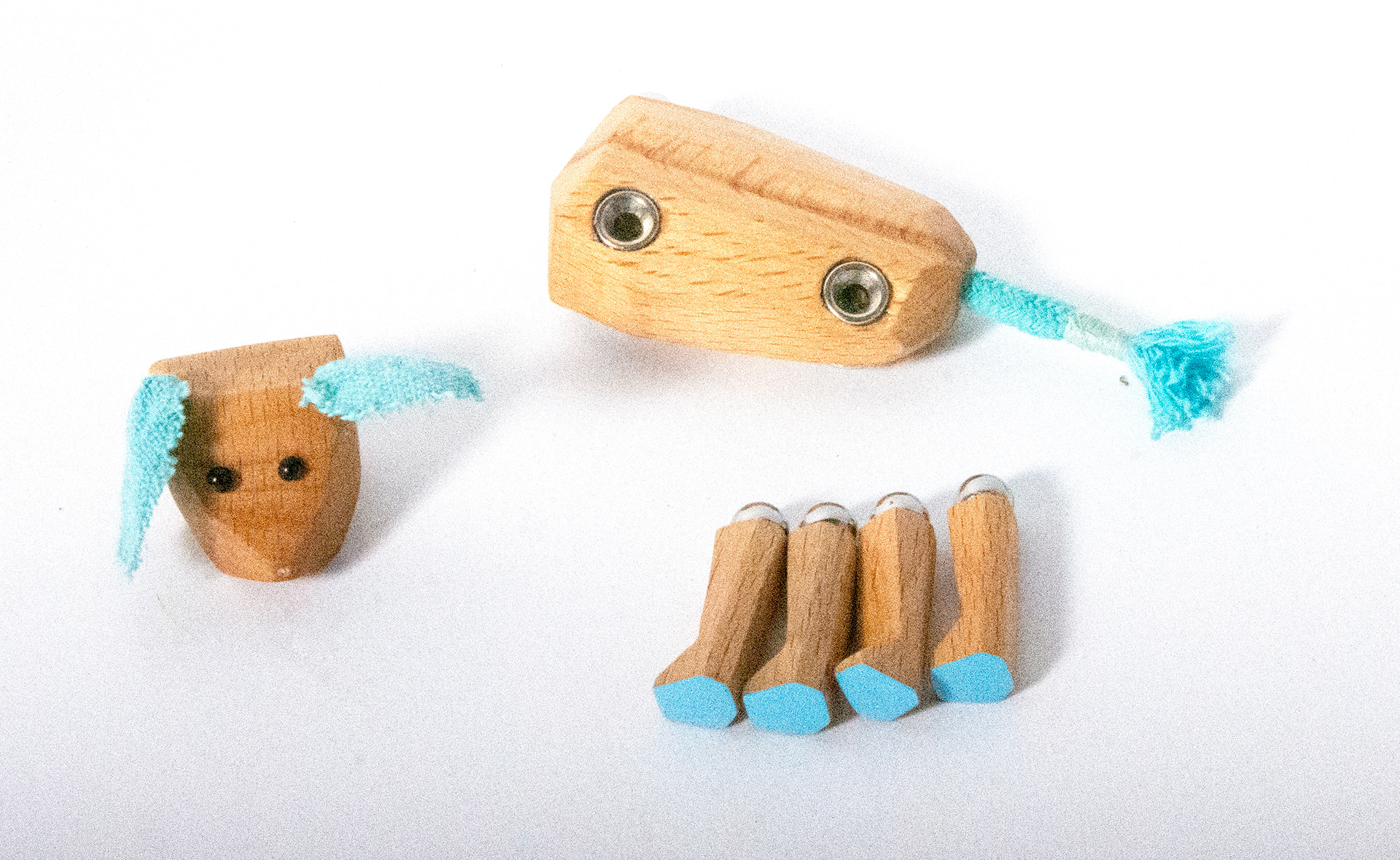 Dog character broken into modular parts - head, body, and four legs