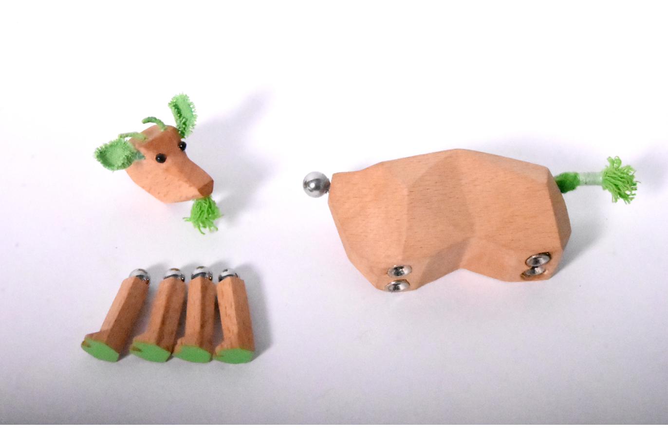Goat character broken into modular parts with green horns