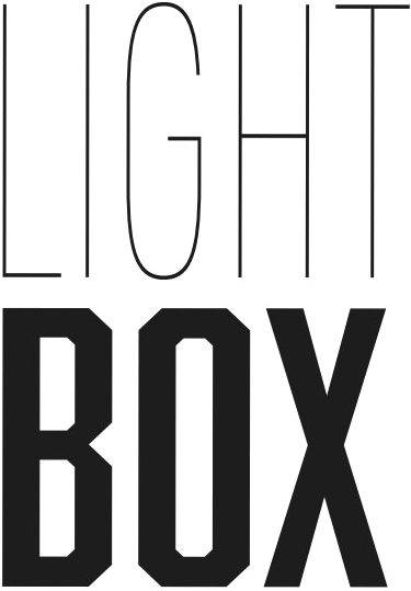 LIGHT BOX wordmark - LIGHT in thin geometric sans-serif above BOX in heavy condensed bold
